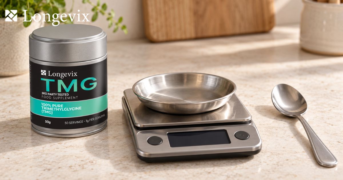 Longevix TMG Powder 50g tin beside a precision scale and teaspoon on a clean stone worktop